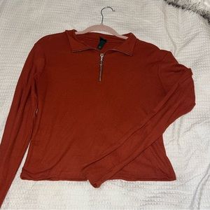 Orange cropped ribbed quarter zip top